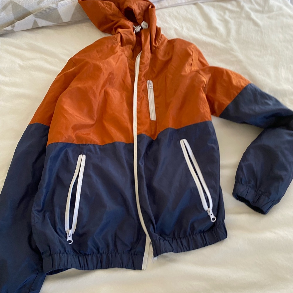 Vibrant Orange and Navy Windbreaker